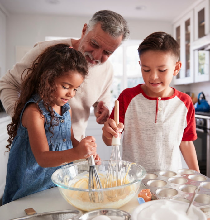 father and children baking