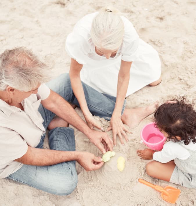 people playing in sand